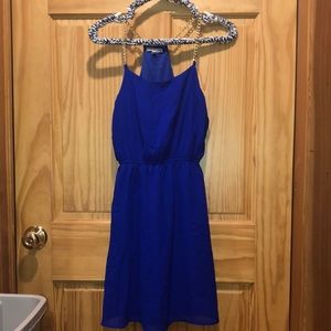 Gorgeous blue mini dress with gold chain straps